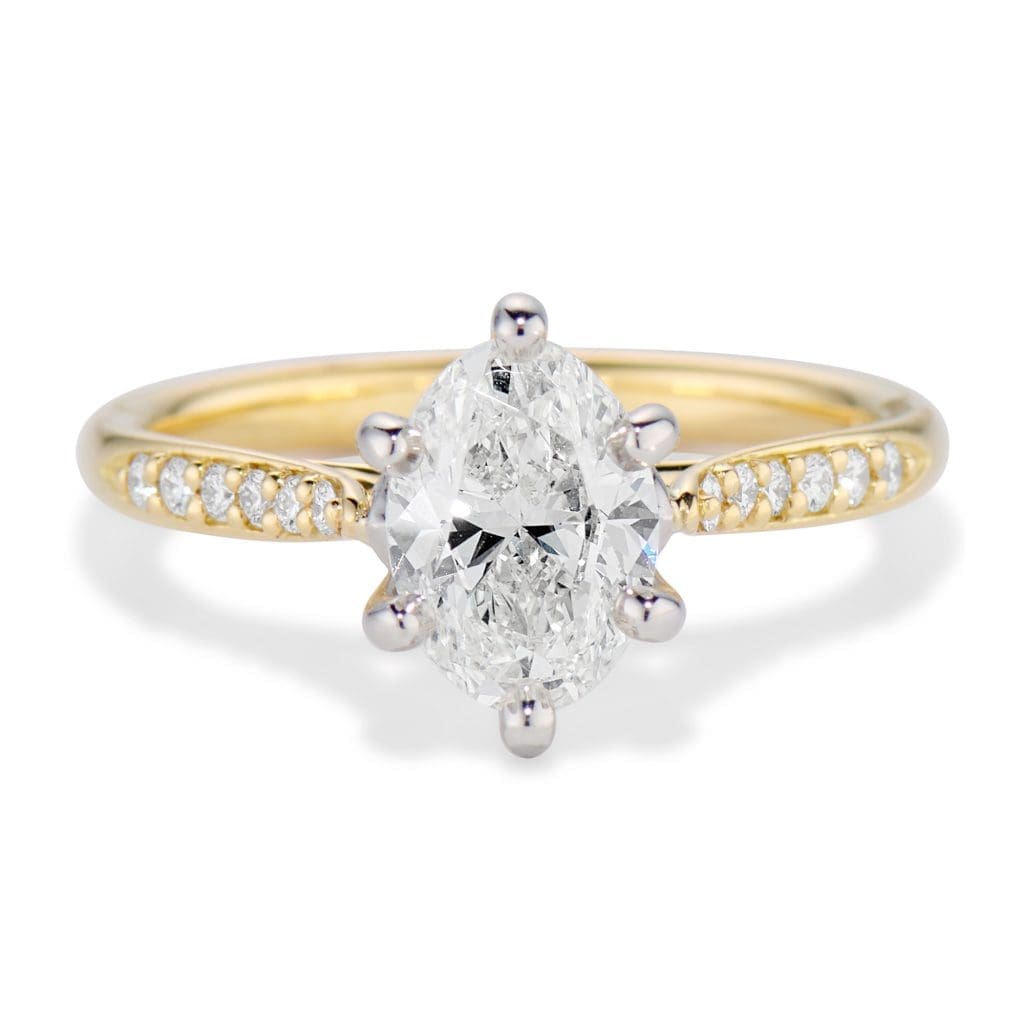 Jubilee Diamond Engagement ring with oval center Jubilee Ring with Oval diamond center and diamond band from Brown Goldsmiths Signature Ring Collection